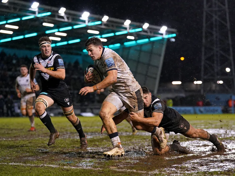 A guest transformed into a rugby player on a wet pitch